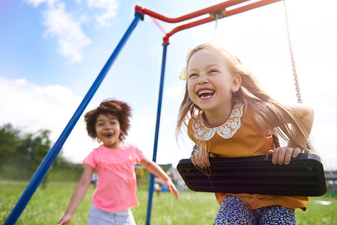 close-up-young-beautiful-girls-playing-with-swing.jpg