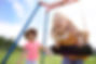close-up-young-beautiful-girls-playing-with-swing.jpg