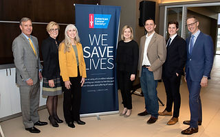 Group Shot with Banner.jpg