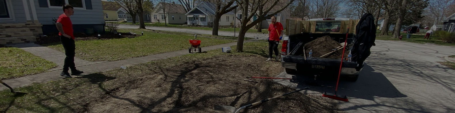 the crew laying top soil & grass seed 2