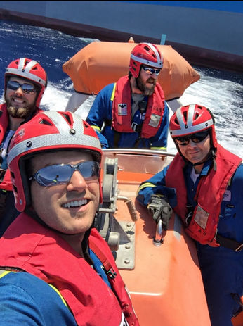 Four Mariner in a skiff