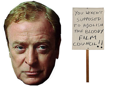 michael-caine and sign high.jpg