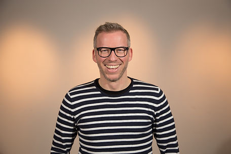 Man with Black Frame Glasses