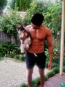 Athletic guys and cats
