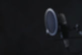 Schwarzes Microphon mit Logumedia Logo