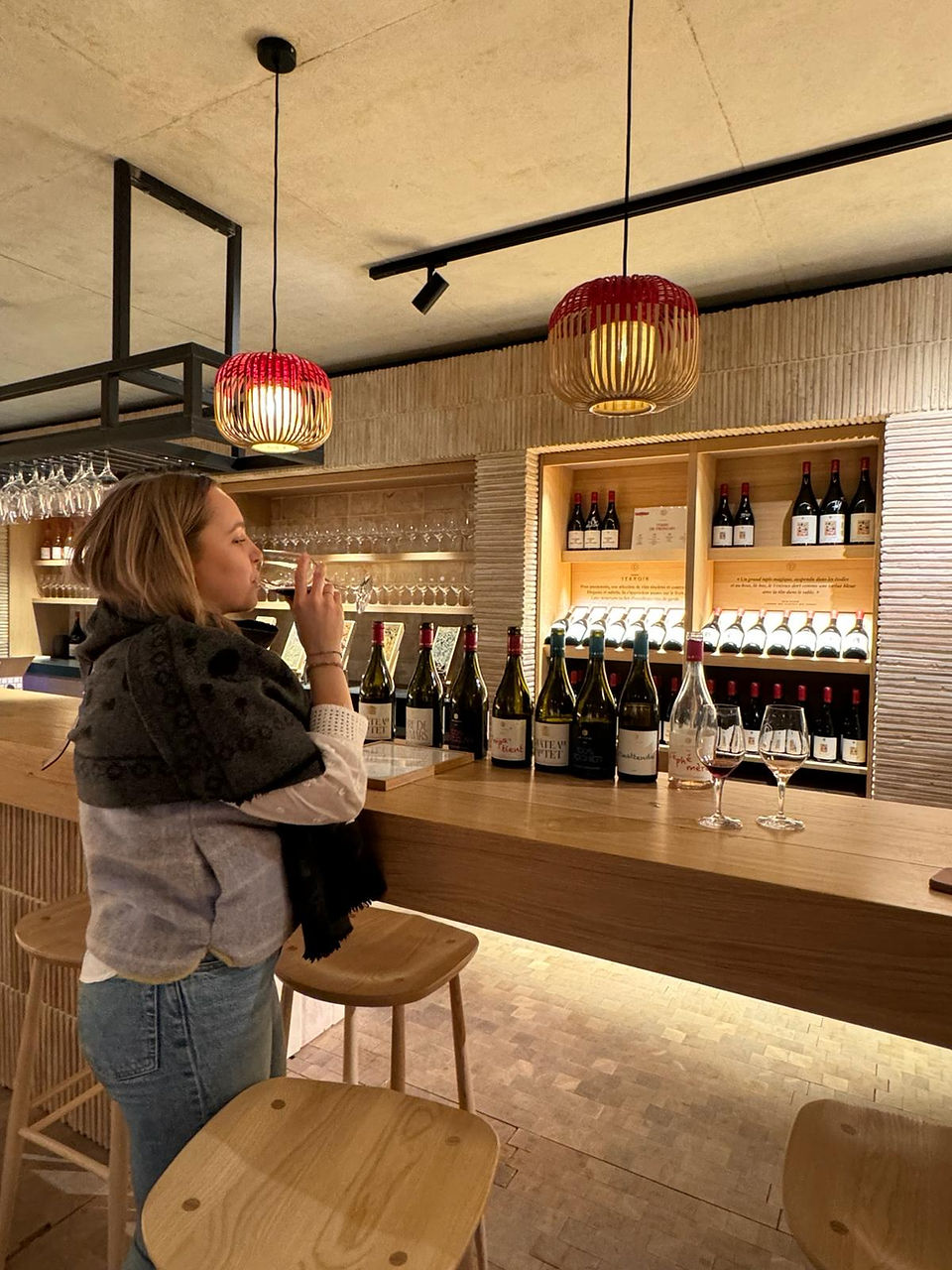 A woman tasting wine