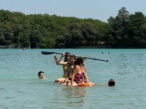 teenagers on a paddleboard