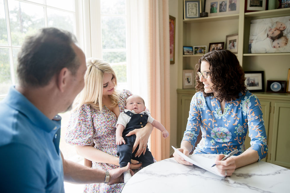 Kendra talking to family in a table