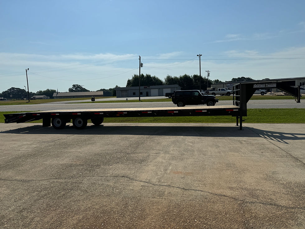 Thumbnail: Gratimax deckover gooseneck flatbed trailer with dual axles, wood deck, and reinforced steel frame, designed for heavy-duty equipment transport and commercial hauling.