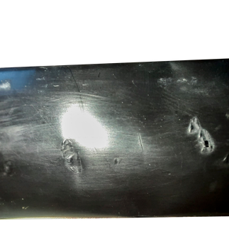 Тамшы таспасын мөлдір пленканың линза әсерінен қорғау