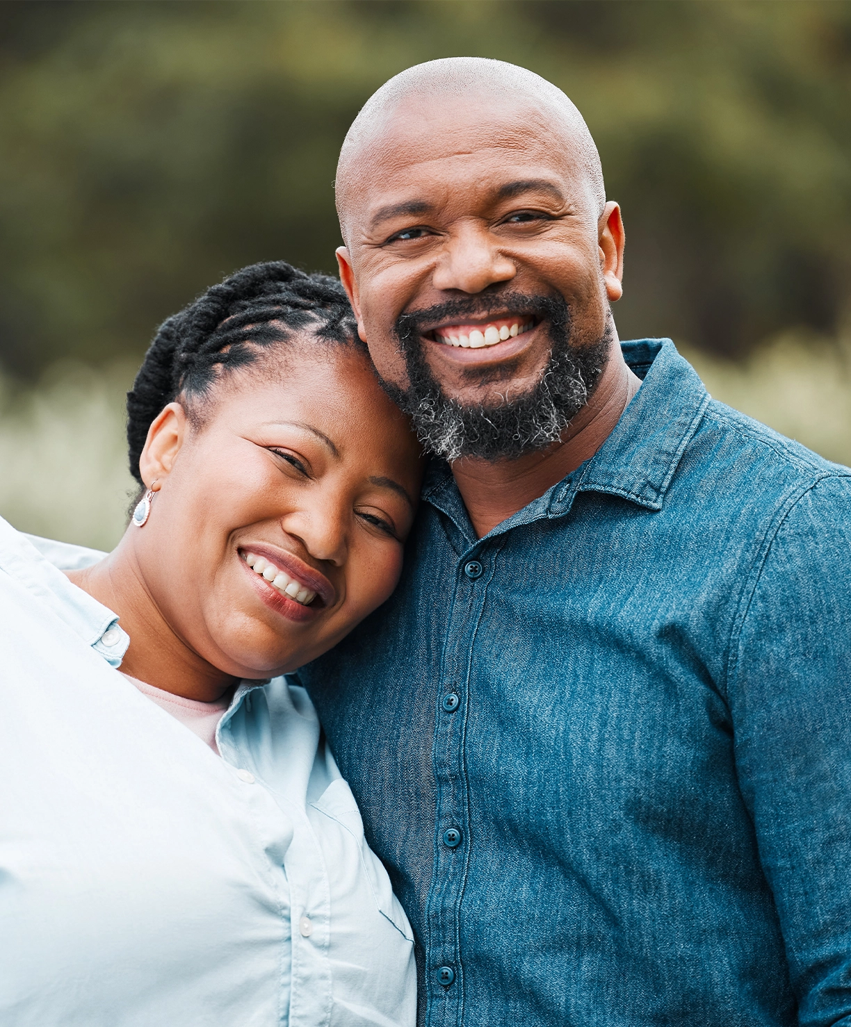 Small testimonial image of happy couple who have been supported by Mr Kanzara