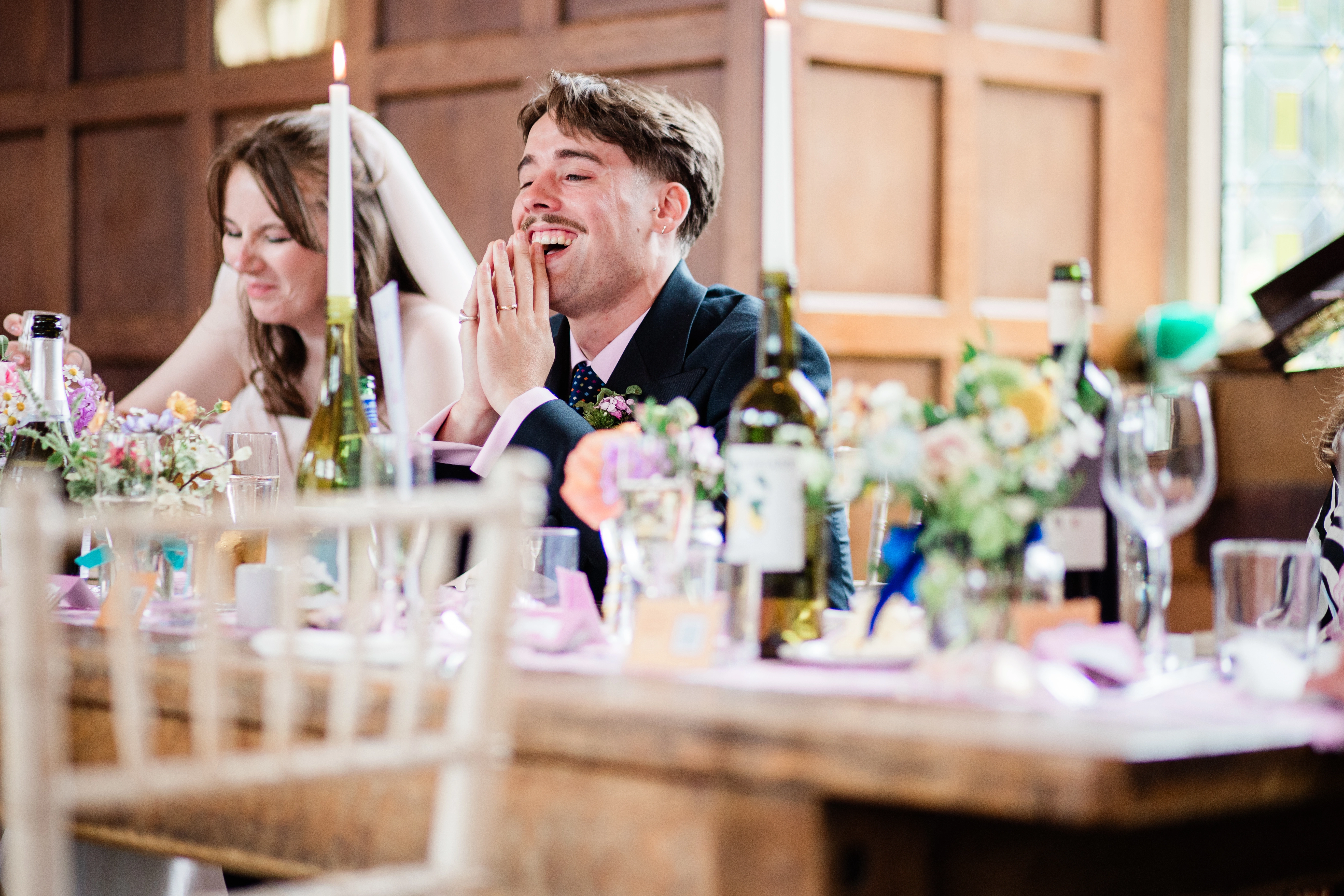 The groom looking slightly embarrased