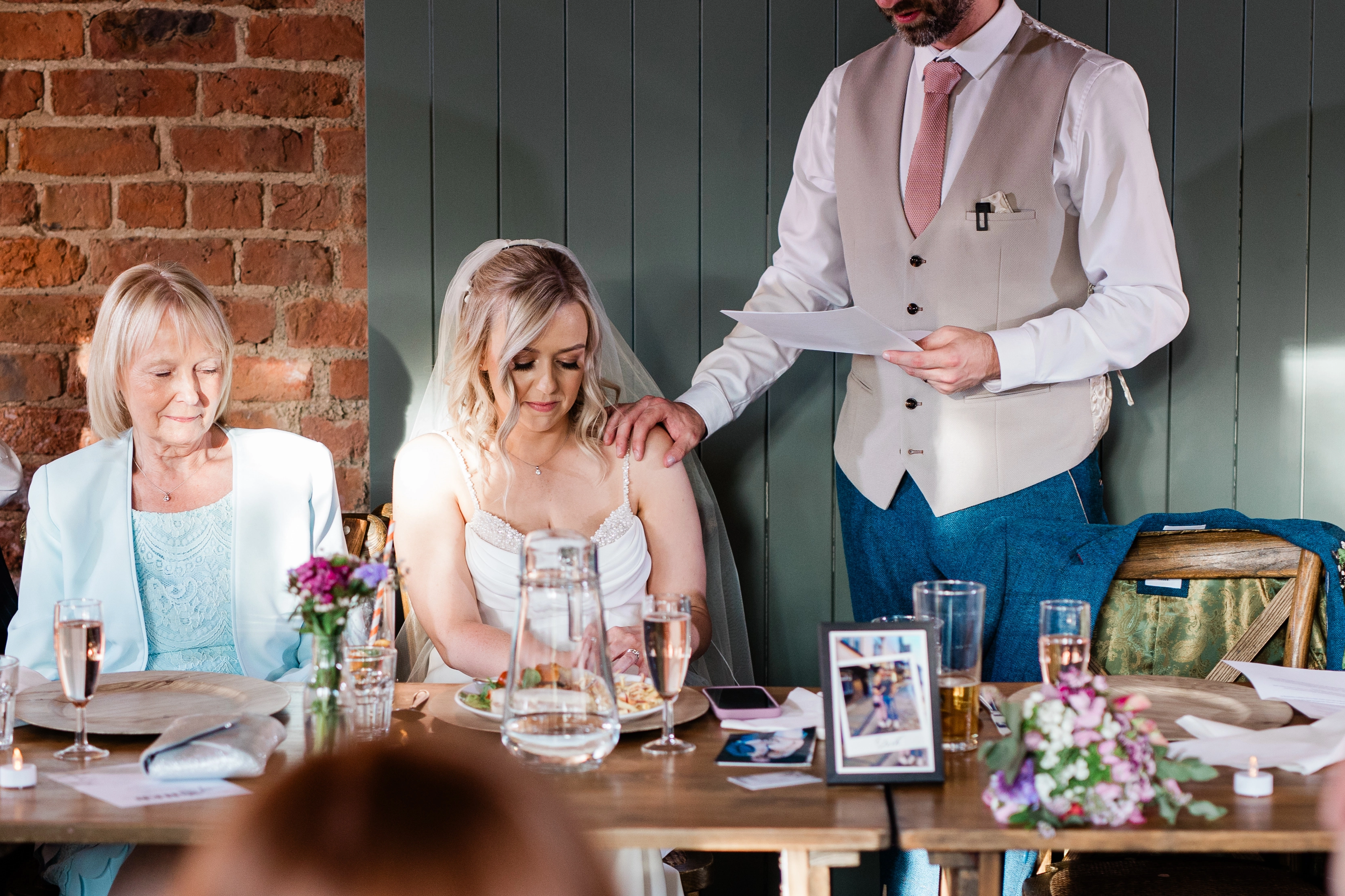 The bride getting emotional during the grooms speech