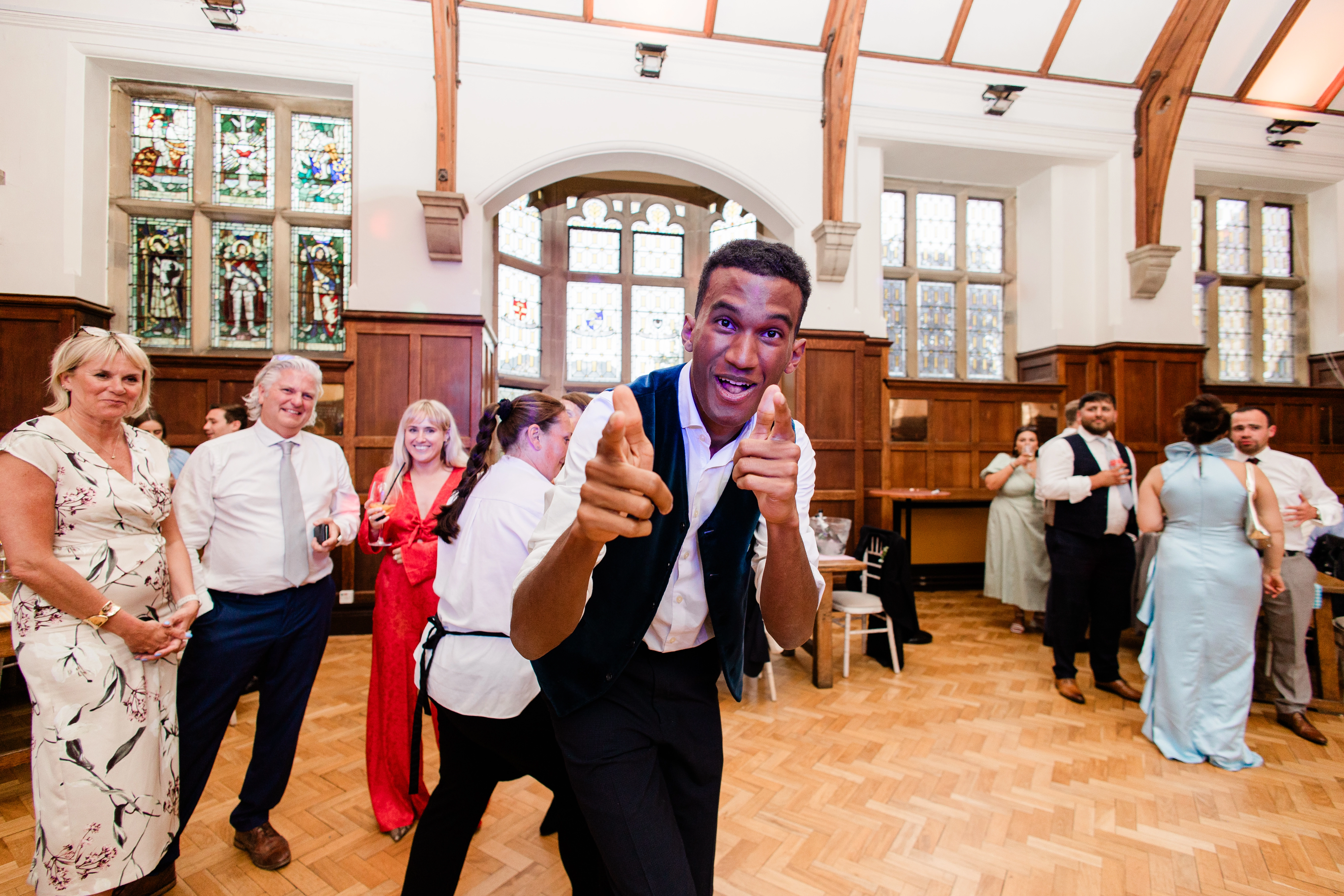 a Guest pointing at the camera on the dance floor