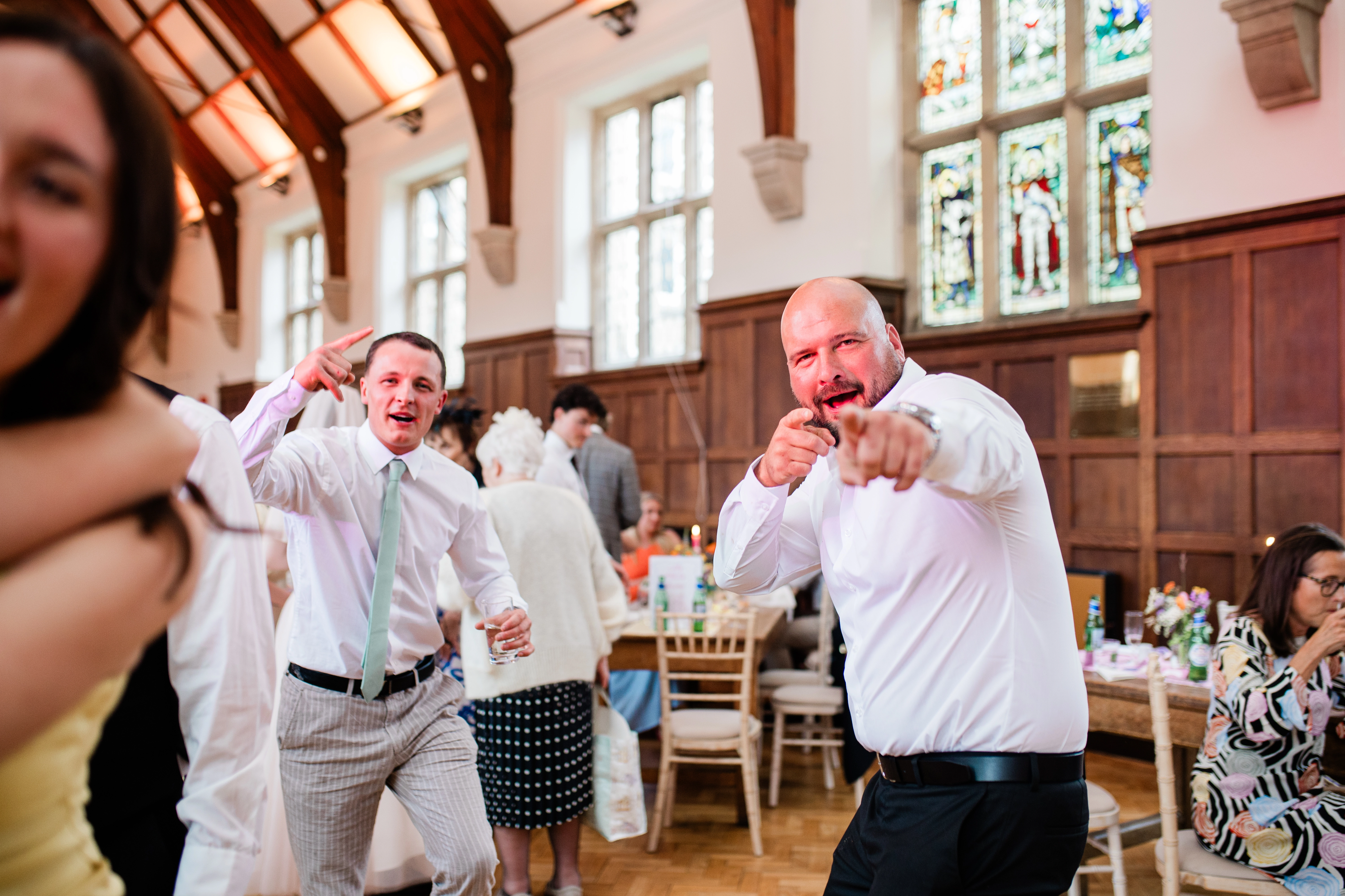 A guest pointing at the camera