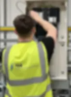 Tomos Durnell Electrical-working-in-a-factory