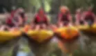 ladies on one of beverleys trips on a boat trip and kayak down a beautiful river.webp