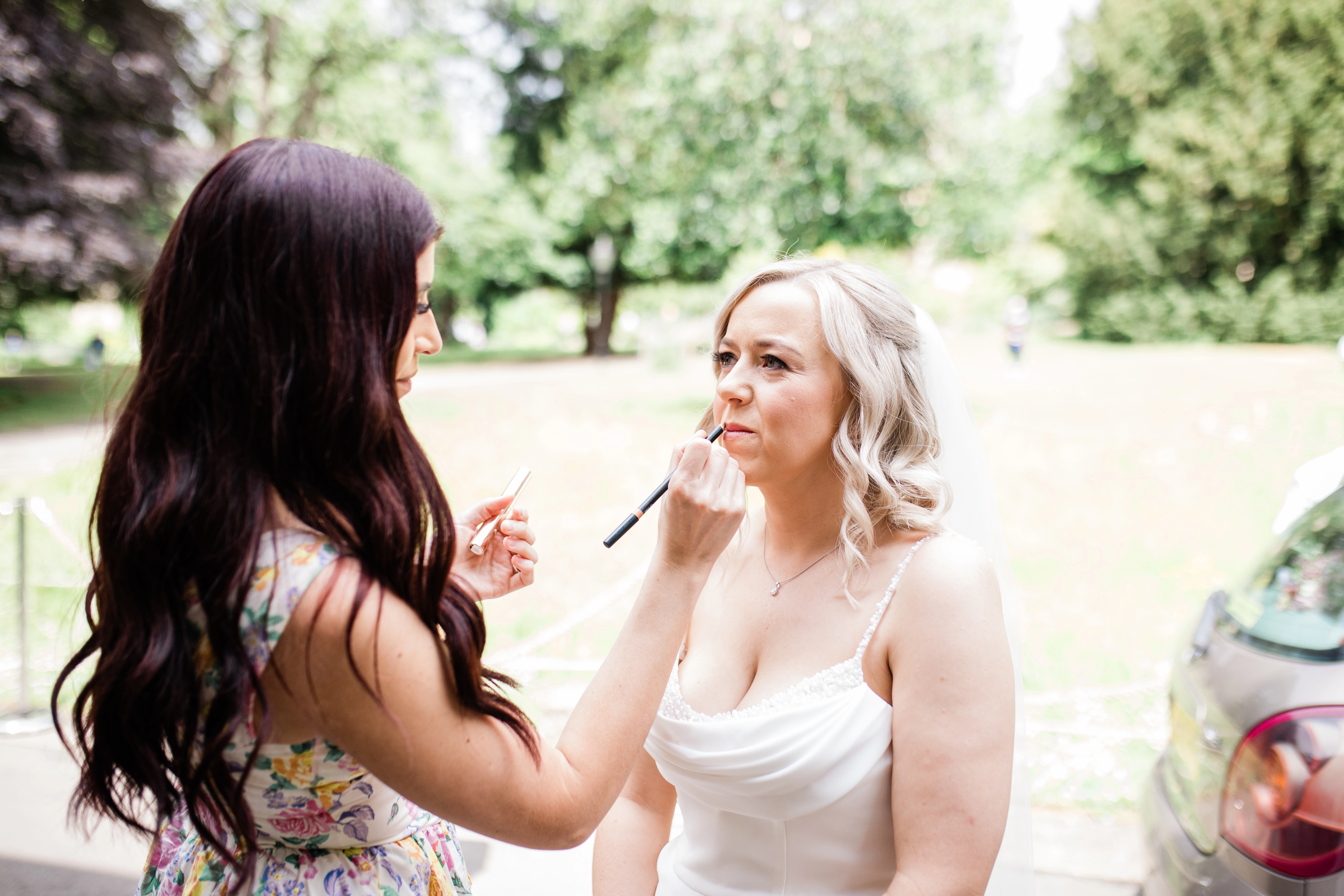 final makeup touch ups before the bride goes into the ceremony