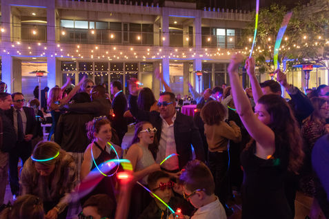 Guests partying with glow sticks