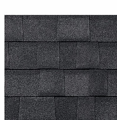 Close-up of onyx black asphalt roof shingles.