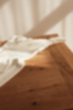 a wedding dress lying on a table