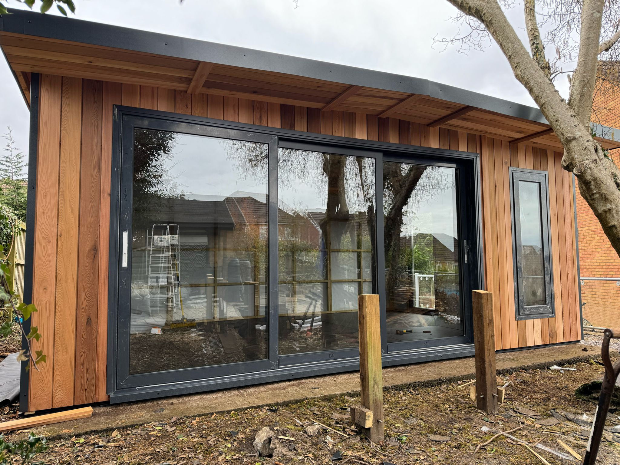 20x13 12ft Sliding doors, 2 windows, Single Ali Door & R/Apex in Cedar