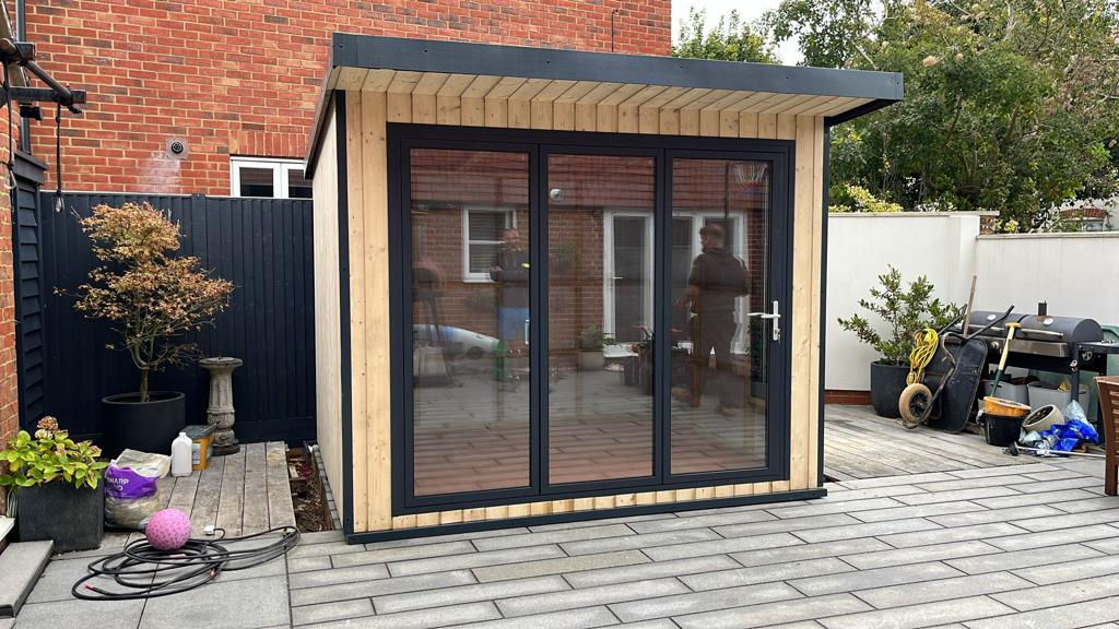 10x8 W/Bifold Doors & 1 Window in Tanalised Spruce