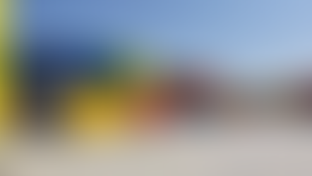 An eclectic street with shops housed in colourful containers