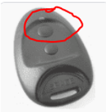  Die Fernbedienung der Automatik mit der oberen Taste, die rot markiert ist.