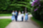 Wedding party walking down Newstead Abbey path