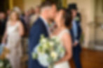 Georgina & Justin at their Newstead Abbey wedding with the first kiss at the alter