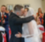 Wedding couple's first kiss at Eastwood Hall
