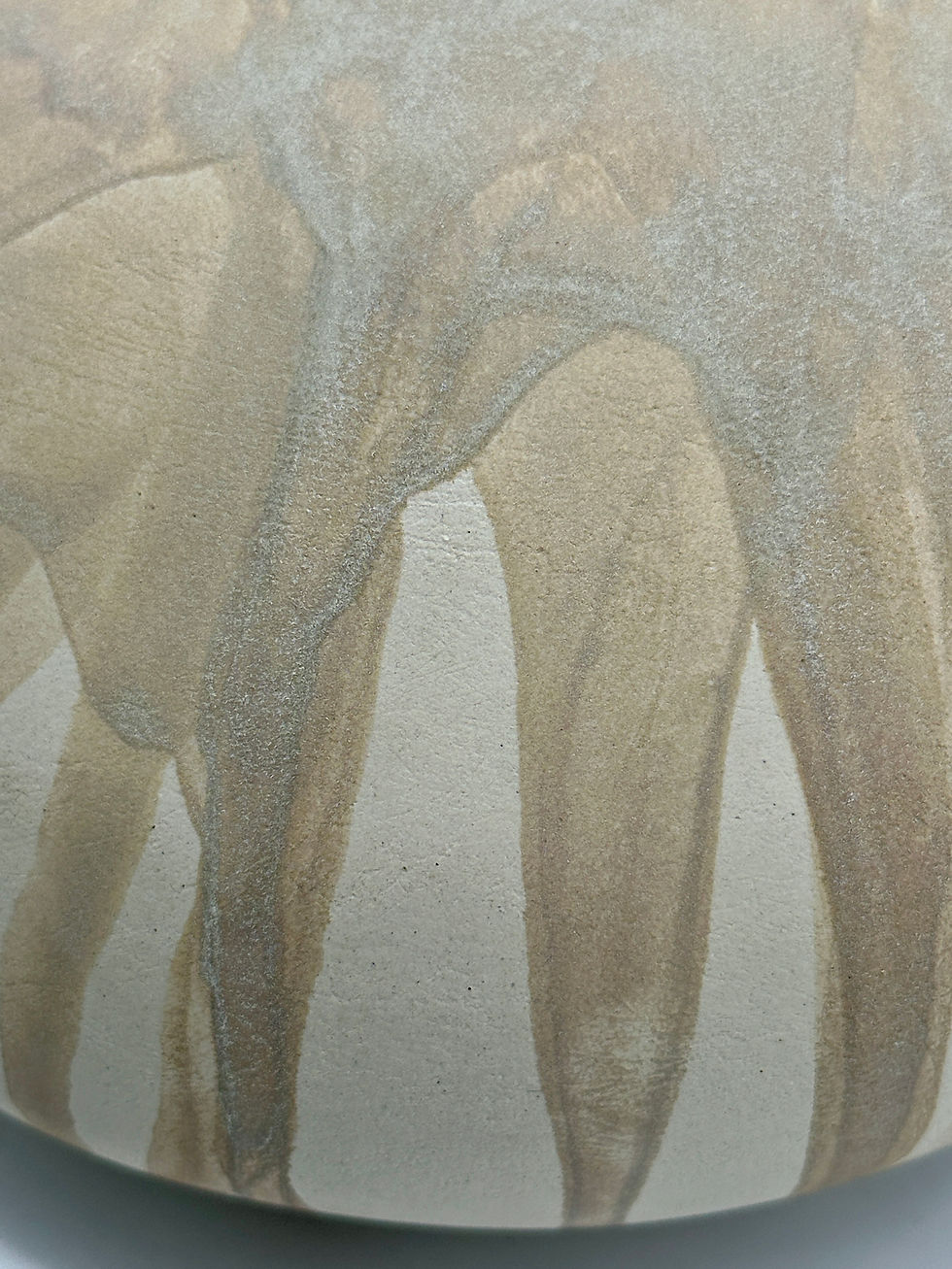 Miniature : Abstract art of a beige, veined vessel with dripping design.