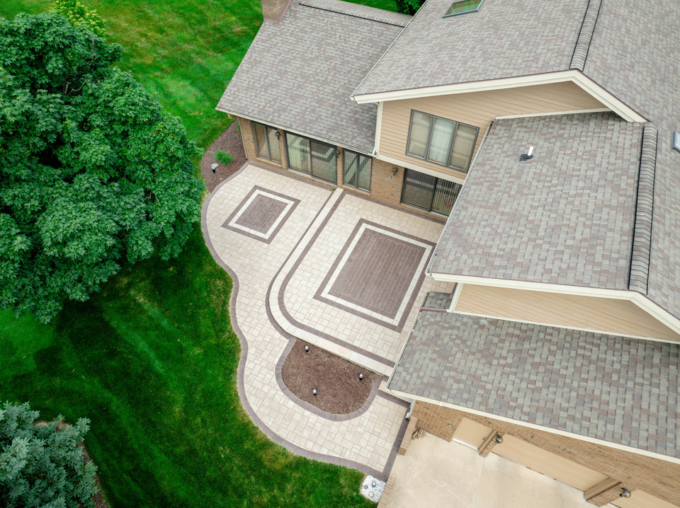 Curved brick paver patio design
