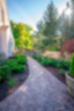 Expert walkway and driveway installation by Foxscapes for homes in Howell and surrounding Southeast Michigan