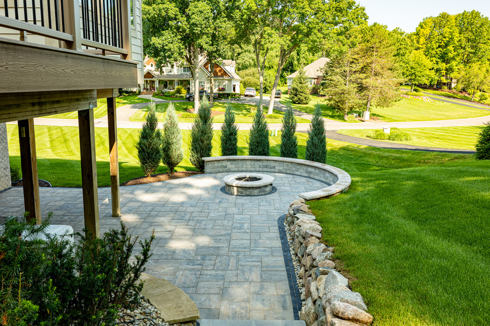 Backyard patio with fire pit area
