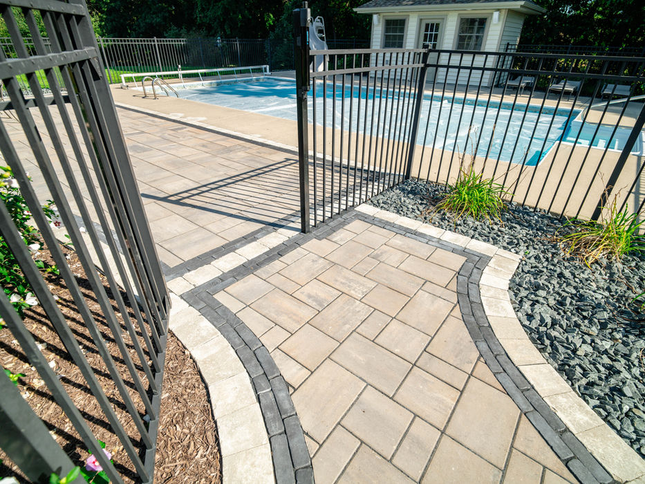Modern concrete paver walkway in Hartland neighborhood