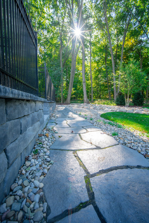 Front entry paver walkway installation in Lansing area