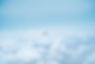Airplane Above the Clouds