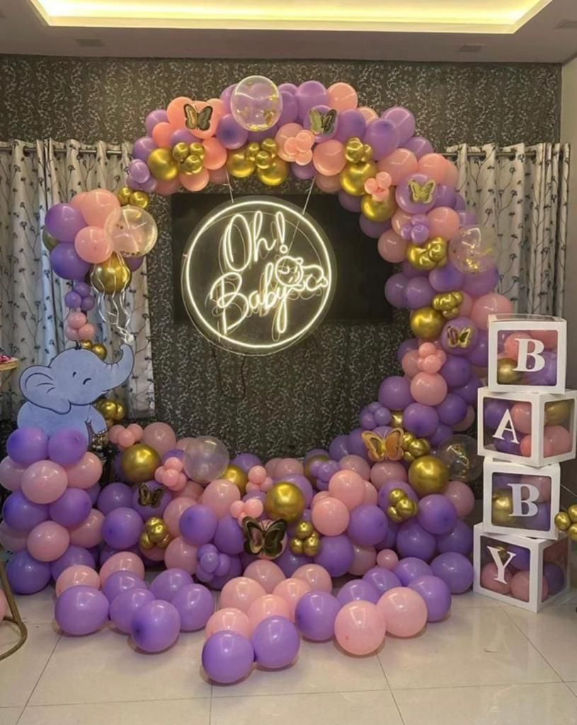 Baby shower balloon arch with Oh! Baby neon sign by AAkaar
