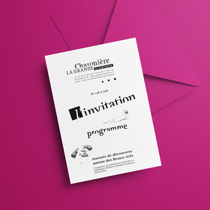 A white invitation card with black text lies on a pink envelope. French text mentions "La grande chamière,” a program schedule, and an art discovery event from 2pm to 8pm.