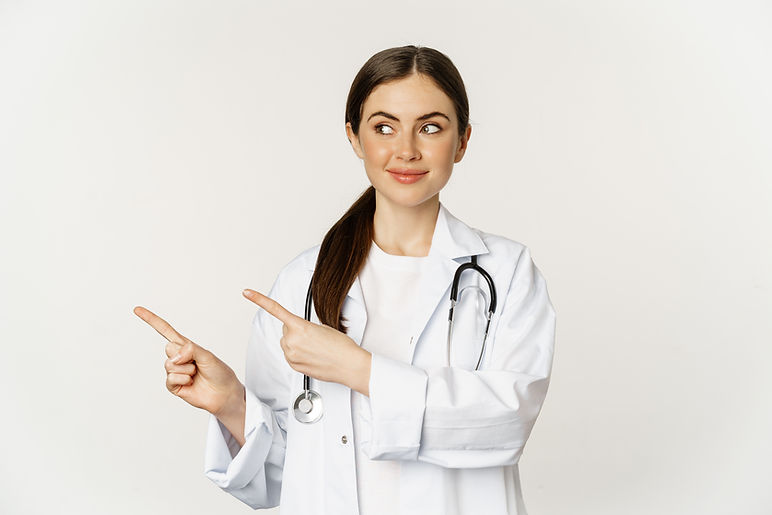 portrait-smiling-young-woman-doctor-healthcare-medical-worker-pointing-fingers-left-showin