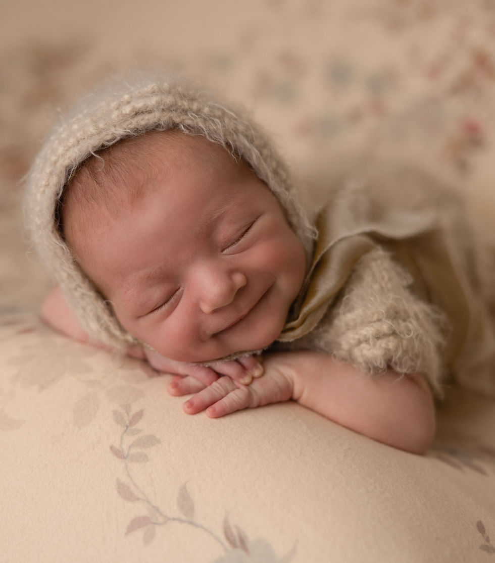 smiling newborn during Minneapolis newborn photo session