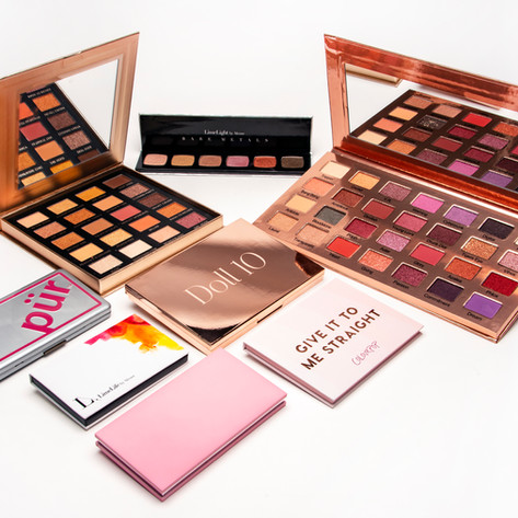 Selection of colorful open eye shadow palettes