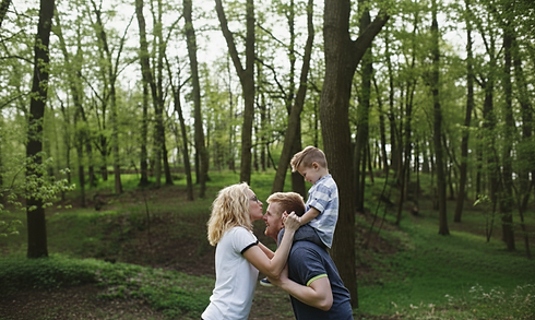 Family of three enjoying time together in Lakeville after acupuncture sessions that reduce pain, improve sleep, and support lasting wellness.