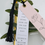 Thumbnail: Blush and White Wedding Day Place name tags with black tassel