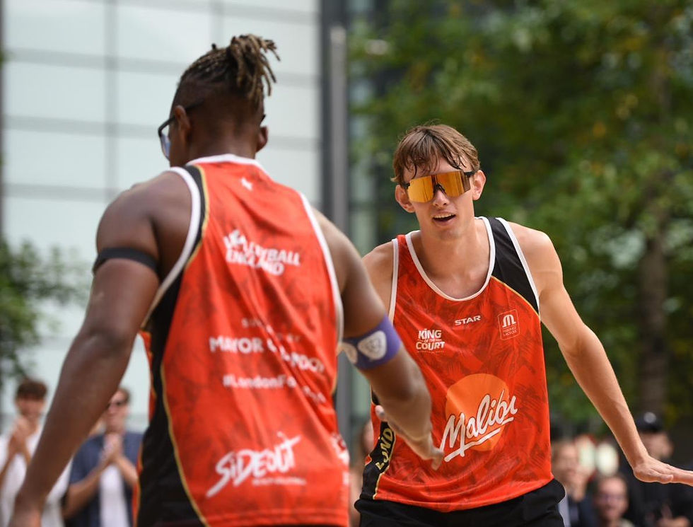 Freddie Bialokoz serving with Issa Batrane on court