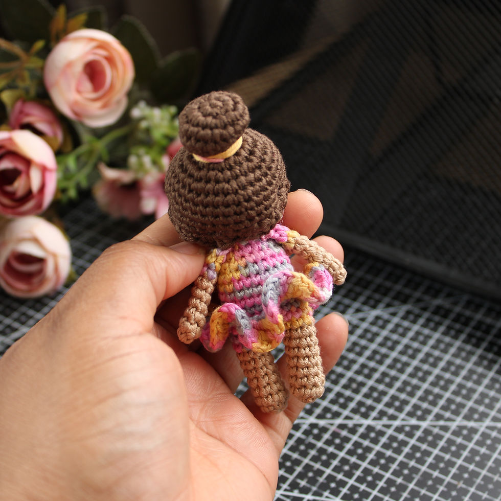 Thumbnail: Mini crochet doll in Canelle, Pink Multi and Tropic Brown