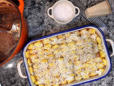 Vegetarian pie with grated cheese on top