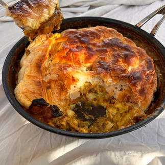 baked curried cauliflower cheese pie and a spoonful